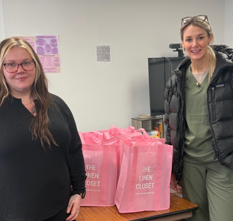 Lauren Lohse of LL Beauty with Bridge Home staff celebrating the 4th annual sheet drive partnership