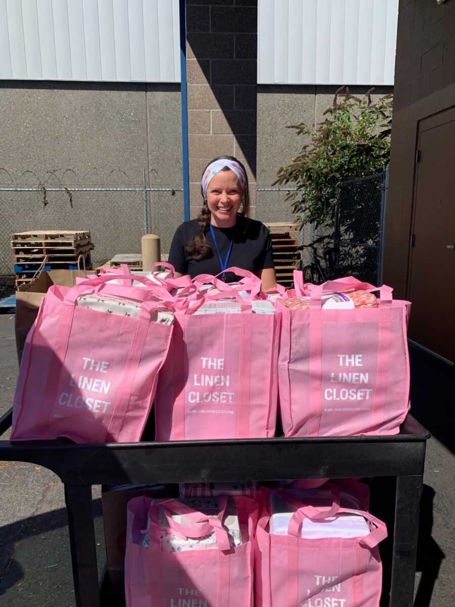 Molly Evjen, Director of Volunteers at Share Vancouver, with The Linen Closet delivery team