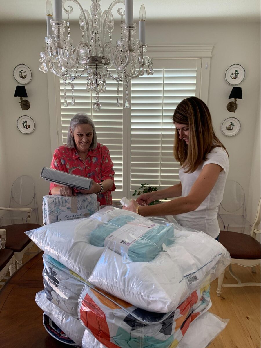 Residents at Central Park Place greeting the Linen Closet delivery team