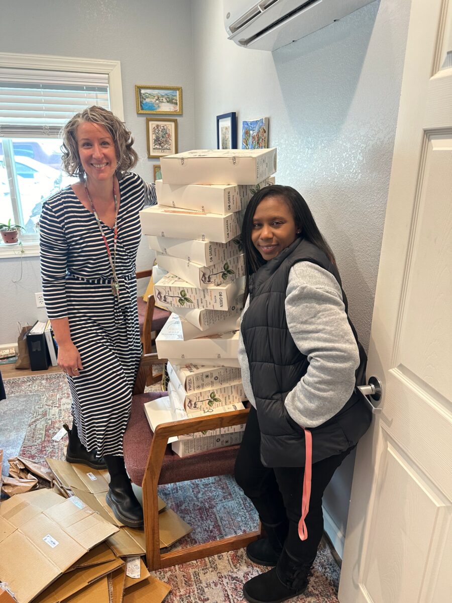 Julie Cloninger and Ched Ellis at Haywood Pathways Center in Waynesville, NC receiving new sheets
