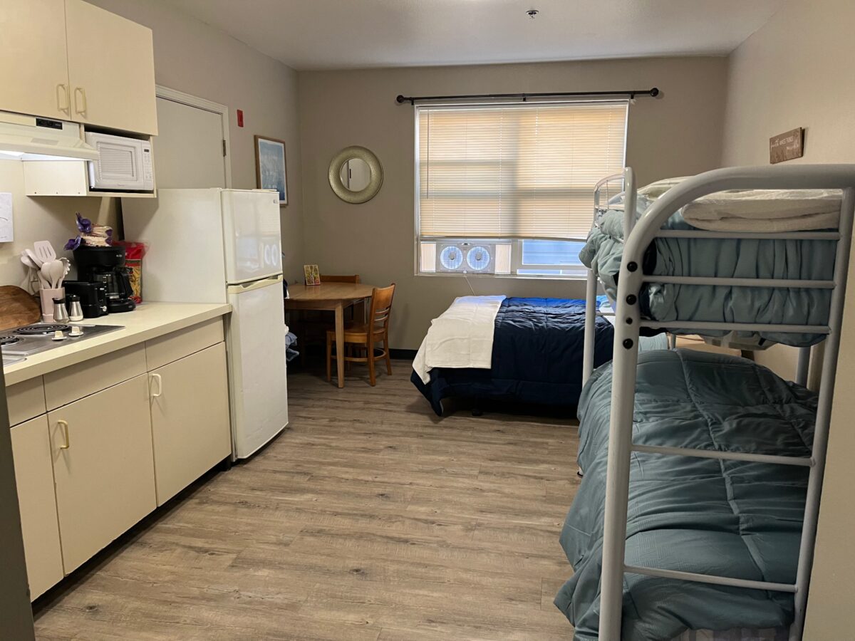 Volunteers delivering new bedding to Open House Ministries suites