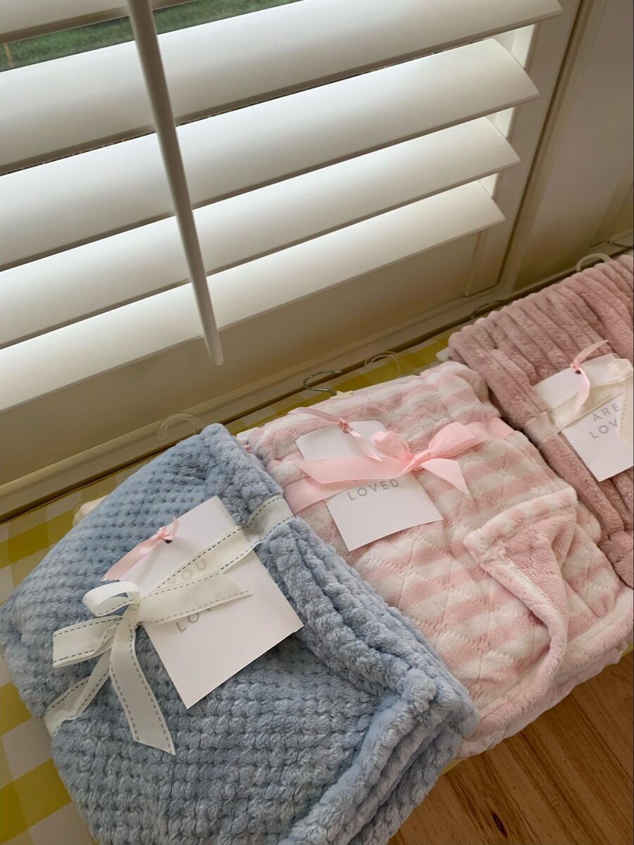 New baby blankets donated through Young Lives for teen mothers at Christmas