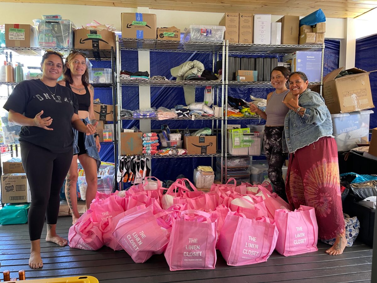 Pohai and Cora-Lei from The Maui Farm with volunteers, delivering bedding bundles to Lahaina families